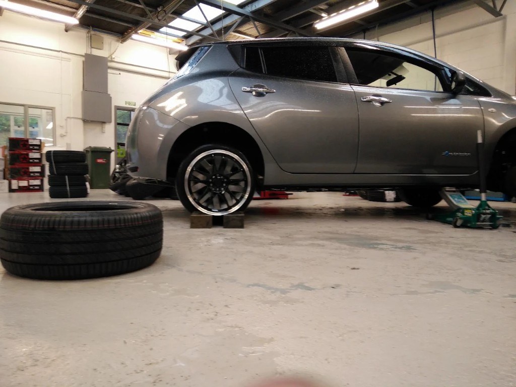 Vehicle being fitted with tyres at The Tyre Clinic Porirua