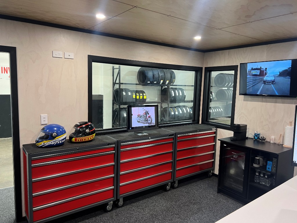 Customer lounge and wheel display at The Tyre Clinic Wellington